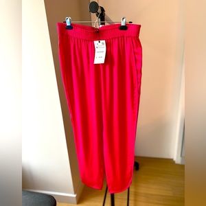 Pink satin dress pants.